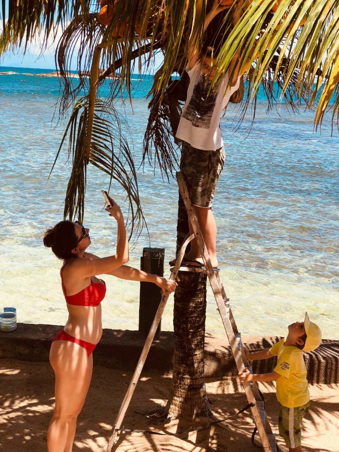 Rainbow Beach Apartments & Rooms Calibishie Buitenkant foto